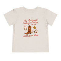 The Rootinest Tootinest Cowboy in the Wild Wild West Bella Canvas Toddler Short Sleeve Tee