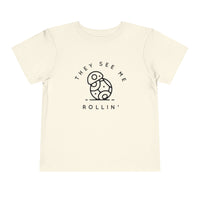 They See Me Rollin' Bella Canvas Toddler Short Sleeve Tee