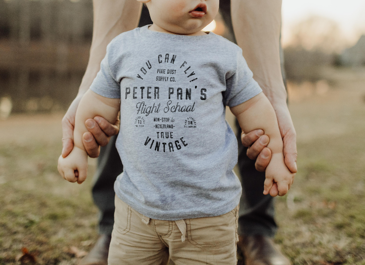 Pan's Flight School Bella Canvas Baby Short Sleeve T-Shirt